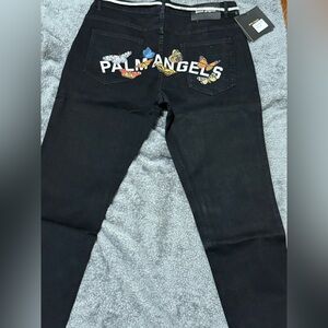 Palm Angels Black Pants with Vibrant Butterfly Accents